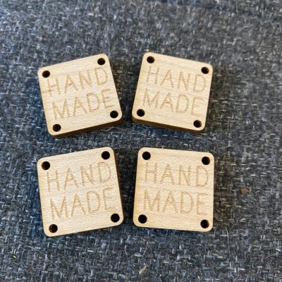 set of handmade tags maple